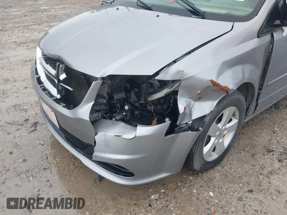 2013 Dodge Grand Caravan SE with VIN 2C4RDGBG2DR773577, listed as a IAAI auction lot 41823951 with 226,498 mi miles and . Bid and sale history available at DreamBid. Image 6.