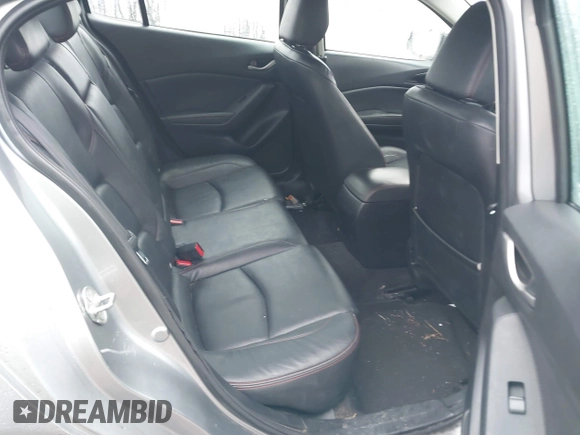2016 Mazda 3 i Grand Touring z VIN 3MZBM1X74GM245295, wystawiony jako IAAI lot #41079843 z przebiegiem 183 480 mil mil oraz . Historia ofert i sprzedaży dostępna na DreamBid. Obrazek 8.