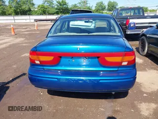 2002 Saturn SL with VIN 1G8ZK52742Z289921, listed as a IAAI auction lot 42340896 with 165,328 mi miles and . Bid and sale history available at DreamBid. Image 16.
