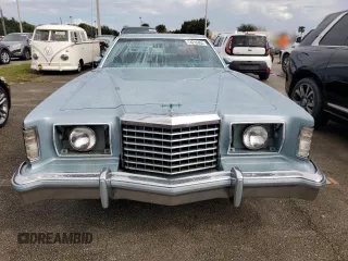 1977 Ford Thunderbird z VIN 7G87S303225, wystawiony jako Copart lot #74216404 z przebiegiem 48 305 mil mil oraz Szkody całkowita. Historia ofert i sprzedaży dostępna na DreamBid. Obrazek 5.