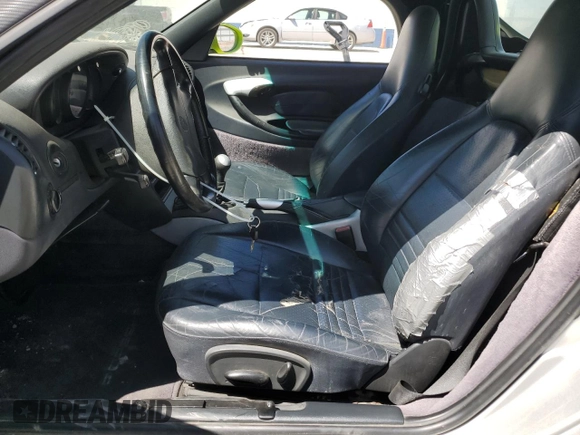 1999 Porsche Boxster with VIN WP0CA2987XU622760, listed as a Copart auction lot 59898355 with 104,425 mi miles and Salvage title. Bid and sale history available at DreamBid. Image 7.