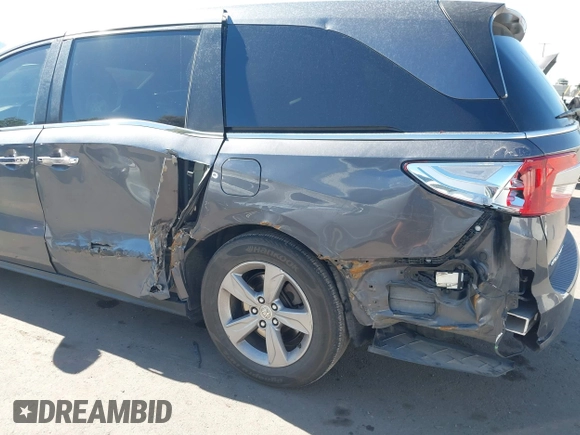 2018 Honda Odyssey EX-L z VIN 5FNRL6H7XJB067694, wystawiony jako IAAI lot #42177338 z przebiegiem 159 670 mil mil oraz . Historia ofert i sprzedaży dostępna na DreamBid. Obrazek 6.