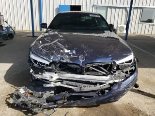 2018 BMW 5 Series 530i z VIN WBAJA5C50JG898675, wystawiony jako Copart lot #51188145 z przebiegiem Nie podano mil oraz Szkody całkowita. Historia ofert i sprzedaży dostępna na DreamBid. Obrazek 5.