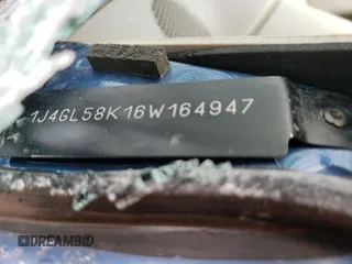 2006 Jeep Liberty Limited z VIN 1J4GL58K16W164947, wystawiony jako Copart lot #57055255 z przebiegiem Nie podano mil oraz Szkoda całkowita • Salvage title. Historia ofert i sprzedaży dostępna na DreamBid. Obrazek 13.
