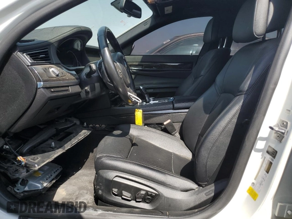 2014 BMW 7 Series 740Li with VIN WBAYE4C57ED137727, listed as a Copart auction lot 51847244 with 136,495 mi miles and Salvage Title. Bid and sale history available at carsss.com. Image 7.