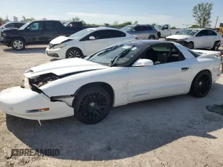 1997 Pontiac Firebird Formula z VIN 2G2FV22P9V2217381, wystawiony jako Copart lot #54208155 z przebiegiem 144 268 mil mil oraz Szkoda całkowita • Salvage title. Historia ofert i sprzedaży dostępna na DreamBid. Obrazek 1.