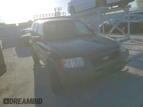 2004 Ford Escape XLS with VIN 1FMYU921X4KA14947, listed as a Copart auction lot 71589544 with 173,890 mi miles and Salvage Title. Bid and sale history available at DreamBid. Image 11.