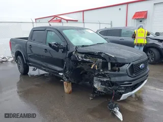 2020 Ford Ranger XL with VIN 1FTER4FH2LLA92828, listed as a IAAI auction lot 41558790 with 64,838 mi miles. Bid and sale history available at carsss.com. Image 1.
