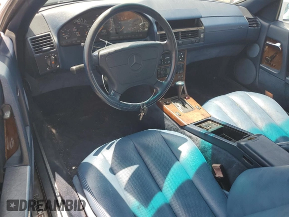 1994 Mercedes-Benz SL with VIN WDBFA63E8RF100874, listed as a Copart auction lot 59604935 with 146,006 mi miles and Salvage title. Bid and sale history available at DreamBid. Image 8.