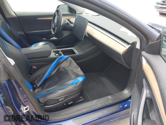 2022 Tesla Model 3 Long Range z VIN 5YJ3E1EB2NF246443, wystawiony jako IAAI lot #42179219 z przebiegiem Nie podano mil oraz . Historia ofert i sprzedaży dostępna na DreamBid. Obrazek 5.