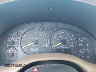 1998 Oldsmobile Bravada z VIN 1GHDT13W7W2702905, wystawiony jako Copart lot #77417944 z przebiegiem Nie podano mil oraz Nie do naprawy. Historia ofert i sprzedaży dostępna na DreamBid. Obrazek 9.