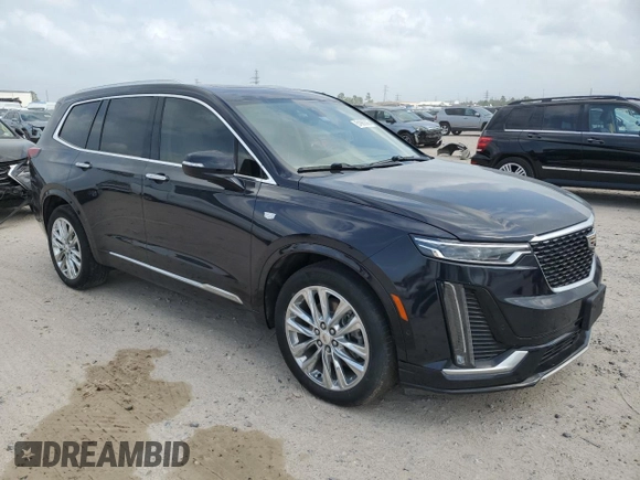 2022 Cadillac XT6 Premium Luxury z VIN 1GYKPERS4NZ105532, wystawiony jako Copart lot #51960895 z przebiegiem 99 336 mil mil oraz Szkoda całkowita • Salvage title. Historia ofert i sprzedaży dostępna na DreamBid. Obrazek 4.