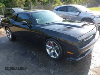 2012 Dodge Challenger R/T Plus z VIN 2C3CDYBTXCH101672, wystawiony jako IAAI lot #42275084 z przebiegiem 133 856 mil mil oraz . Historia ofert i sprzedaży dostępna na DreamBid. Obrazek 1.