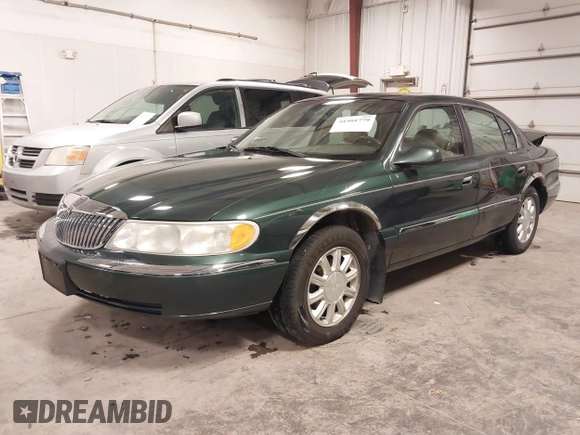 2001 Lincoln Continental with VIN 1LNHM97V11Y691910, listed as a IAAI auction lot 41501779 with 102,715 mi miles and . Bid and sale history available at DreamBid. Image 18.