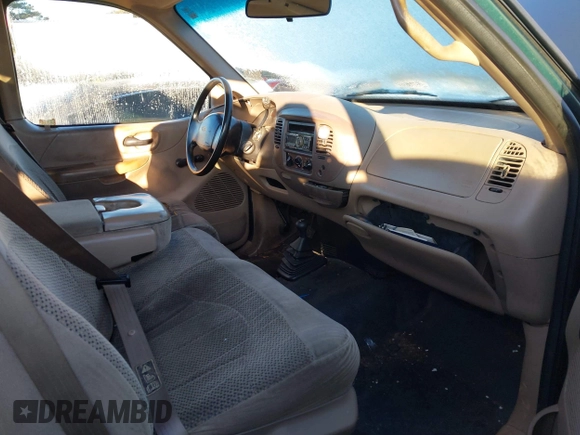 1999 Ford F-150 z VIN 1FTRX18W7XNA40655, wystawiony jako IAAI lot #41445754 z przebiegiem 362 296 mil mil oraz . Historia ofert i sprzedaży dostępna na DreamBid. Obrazek 5.