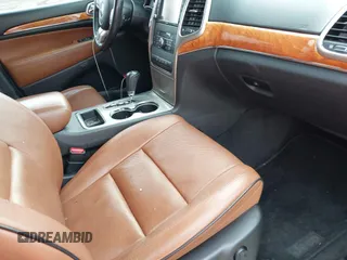 2013 Jeep Grand Cherokee Overland with VIN 1C4RJECG5DC621149, listed as a IAAI auction lot 41255140 with 157,355 mi miles. Bid and sale history available at carsss.com. Image 5.