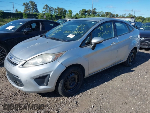 2013 Ford Fiesta S with VIN 3FADP4AJ6DM223132, listed as a IAAI auction lot 42317500 with 104,003 mi miles and . Bid and sale history available at DreamBid. Image 2.