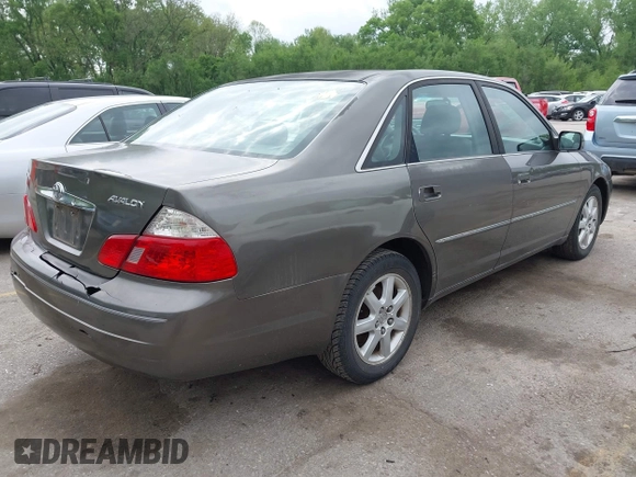 2003 Toyota Avalon XL with VIN 4T1BF28B53U285411, listed as a IAAI auction lot 42140722 with 282,407 mi miles and . Bid and sale history available at carsss.com. Image 4.