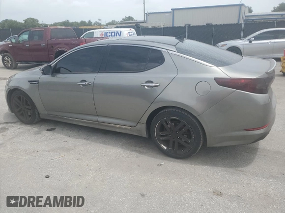 2013 Kia Optima SX with VIN 5XXGR4A62DG116593, listed as a Copart auction lot 59696705 with 120,248 mi miles and Salvage title. Bid and sale history available at DreamBid. Image 2.