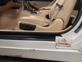 2015 BMW 4 Series 428i xDrive with VIN WBA3T1C52FP821020, listed as a IAAI auction lot 42004707 with 74,951 mi miles and . Bid and sale history available at carsss.com. Image 6.