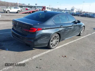 2018 BMW 5 Series M550i xDrive with VIN WBAJB9C55JB049529, listed as a IAAI auction lot 41241917 with 116,265 mi miles and . Bid and sale history available at carsss.com. Image 4.