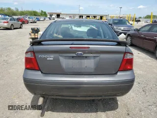 2007 Ford Focus S z VIN 1FAHP34N17W103625, wystawiony jako Copart lot #55300395 z przebiegiem 82 041 mil mil oraz Szkoda całkowita • Salvage title. Historia ofert i sprzedaży dostępna na DreamBid. Obrazek 6.