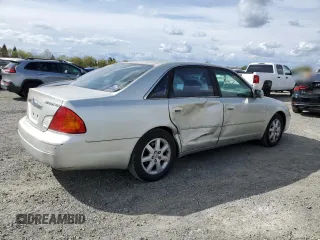 2000 Toyota Avalon XL with VIN 4T1BF28B3YU002835, listed as a Copart auction lot 50902115 with 128,699 mi miles and Salvage Title. Bid and sale history available at DreamBid. Image 3.