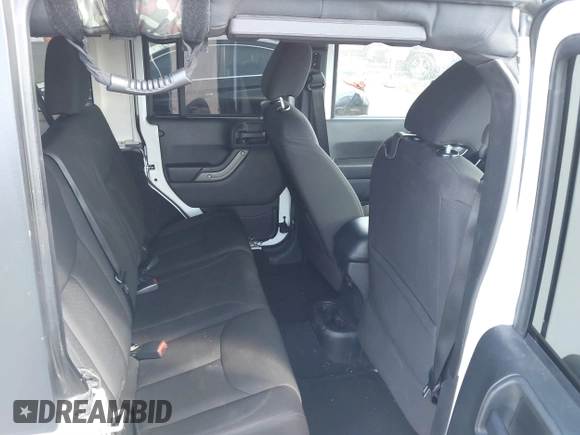 2016 Jeep Wrangler Unlimited Sport with VIN 1C4BJWDGXGL238558, listed as a IAAI auction lot 41670076 with 81,816 mi miles and . Bid and sale history available at DreamBid. Image 8.