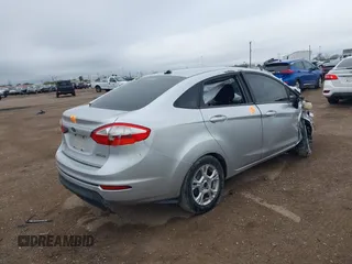 2015 Ford Fiesta SE with VIN 3FADP4BJ2FM220598, listed as a IAAI auction lot 41213342 with 1 mi miles. Bid and sale history available at carsss.com. Image 4.