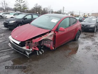 2024 Tesla Model Y Long Range with VIN 7SAYGAEE7RF133073, listed as a IAAI auction lot 41081463 with Not Provided miles and . Bid and sale history available at DreamBid. Image 18.