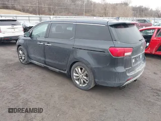 2016 Kia Sedona SX-L with VIN KNDME5C13G6112674, listed as a IAAI auction lot 41711275 with 154,337 mi miles and . Bid and sale history available at carsss.com. Image 3.
