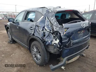 2020 Mazda CX-5 Touring with VIN JM3KFBCM9L0799502, listed as a IAAI auction lot 42007207 with 43,364 mi miles. Bid and sale history available at carsss.com. Image 3.