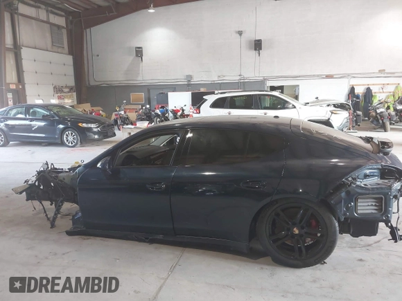 2014 Porsche Panamera GTS with VIN WP0AF2A7XEL083274, listed as a IAAI auction lot 40258451 with 98,861 mi miles and . Bid and sale history available at DreamBid. Image 14.