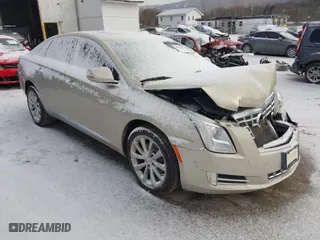 2014 Cadillac XTS Luxury with VIN 2G61M5S37E9304598, listed as a IAAI auction lot 41006051 with 115,879 mi miles. Bid and sale history available at carsss.com. Image 1.