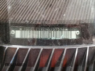 1992 GMC Safari z VIN 1GDEL19W2NB539396, wystawiony jako Copart lot #79221434 z przebiegiem 99 406 mil mil oraz Nie do naprawy. Historia ofert i sprzedaży dostępna na DreamBid. Obrazek 13.