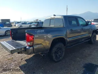 2019 Toyota Tacoma 4WD SR with VIN 3TMCZ5AN3KM268342, listed as a IAAI auction lot 40265512 with 66,789 mi miles. Bid and sale history available at carsss.com. Image 4.