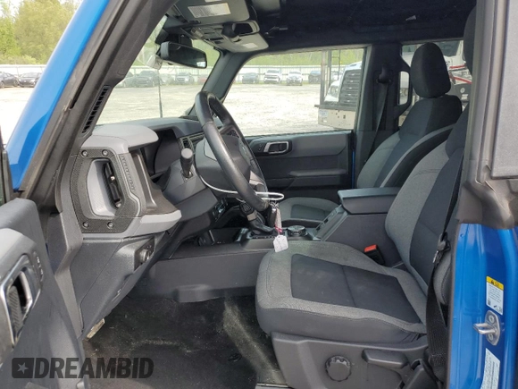 2023 Ford Bronco z VIN 1FMDE5BH7PLB11989, wystawiony jako Copart lot #58302125 z przebiegiem 25 526 mil mil oraz Szkoda całkowita • Salvage title. Historia ofert i sprzedaży dostępna na DreamBid. Obrazek 7.