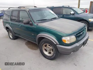 2000 Ford Explorer XLT z VIN 1FMZU63EXYZA22693, wystawiony jako IAAI lot #41350520 z przebiegiem 244 843 mil mil oraz . Historia ofert i sprzedaży dostępna na DreamBid. Obrazek 1.