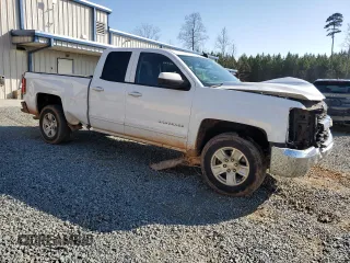 2018 Chevrolet Silverado 1500 LT with VIN 1GCRCREH7JZ194637, listed as a Copart auction lot 44399435 with 111,928 mi miles and Salvage Title. Bid and sale history available at DreamBid. Image 4.