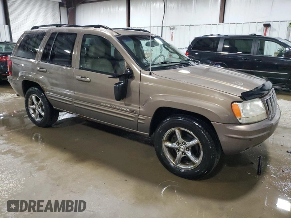 2002 Jeep Grand Cherokee Limited with VIN 1J4GW58NX2C248892, listed as a Copart auction lot 55574615 with 164,010 mi miles and Salvage title. Bid and sale history available at DreamBid. Image 4.