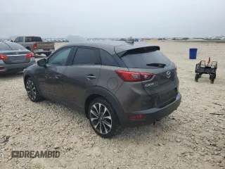 2019 Mazda CX-3 Touring z VIN JM1DKDC71K1408158, wystawiony jako Copart lot #50463675 z przebiegiem 95 578 mil mil oraz Czysty tytuł • Clean title. Historia ofert i sprzedaży dostępna na DreamBid. Obrazek 2.