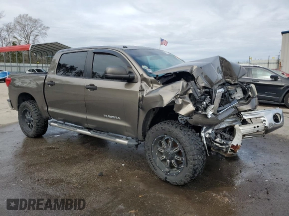 2011 Toyota Tundra z VIN 5TFEY5F1XBX100550, wystawiony jako Copart lot #88046105 z przebiegiem Nie podano mil oraz Szkoda całkowita • Salvage title. Historia ofert i sprzedaży dostępna na DreamBid. Obrazek 4.