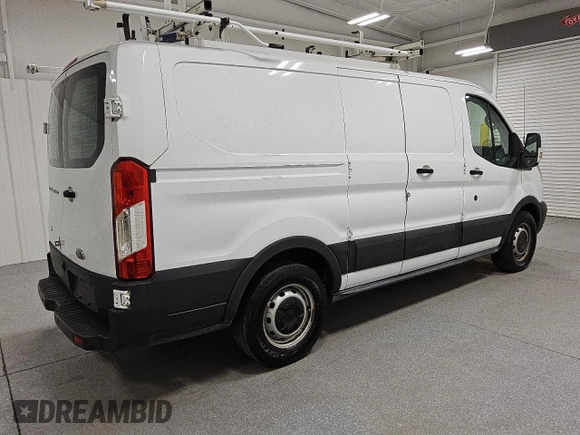 2017 Ford Transit z VIN 1FTYE1ZM0HKB35141, wystawiony jako Copart lot #66254285 z przebiegiem 173 002 mil mil oraz Czysty tytuł • Clean title. Historia ofert i sprzedaży dostępna na DreamBid. Obrazek 3.