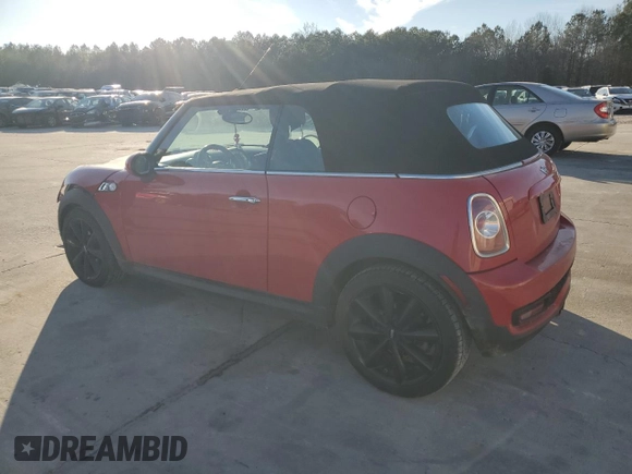 2013 MINI Convertible S with VIN WMWZP3C50DT550554, listed as a Copart auction lot 88415495 with 95,295 mi miles and Salvage title. Bid and sale history available at DreamBid. Image 2.