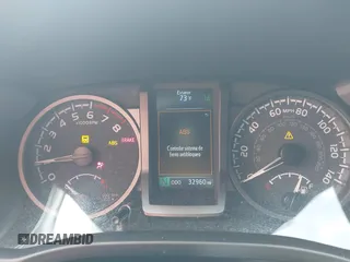 2023 Toyota Tacoma SR with VIN 3TMCZ5AN0PM635933, listed as a IAAI auction lot 42543126 with 32,960 mi miles and . Bid and sale history available at DreamBid. Image 7.