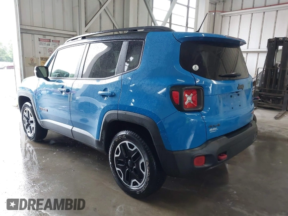 2015 Jeep Renegade Trailhawk with VIN ZACCJBCT0FPB59264, listed as a IAAI auction lot 42203406 with 109,000 mi miles and . Bid and sale history available at DreamBid. Image 3.