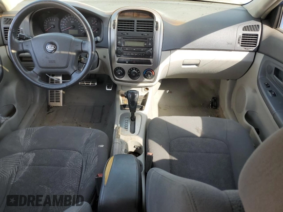 2005 Kia Spectra with VIN KNAFE161555082073, listed as a Copart auction lot 77062804 with 173,387 mi miles and Salvage Title. Bid and sale history available at DreamBid. Image 8.