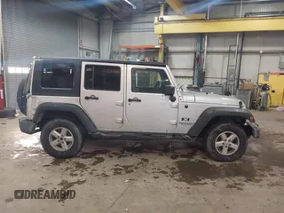 2007 Jeep Wrangler Unlimited X with VIN 1J4GA39167L147516, listed as a IAAI auction lot 41617025 with 119,572 mi miles and . Bid and sale history available at DreamBid. Image 14.