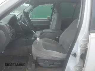 2004 Ford Explorer XLT z VIN 1FMZU63K04UA40603, wystawiony jako Copart lot #62929745 z przebiegiem 147 304 mil mil oraz Szkoda całkowita • Salvage title. Historia ofert i sprzedaży dostępna na DreamBid. Obrazek 7.