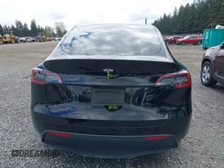 2024 Tesla Model Y with VIN 7SAYGDED3RF119101, listed as a IAAI auction lot 42019817 with 35,714 mi miles and . Bid and sale history available at DreamBid. Image 16.